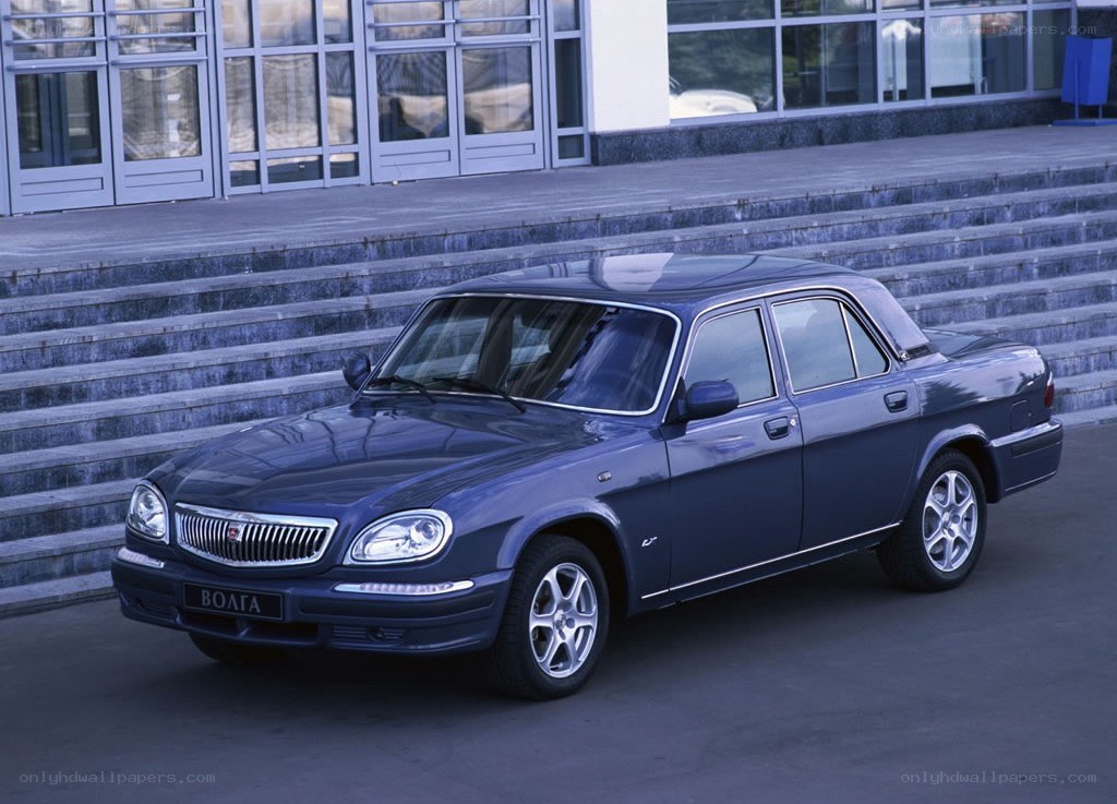Blue Volga sedan on steps