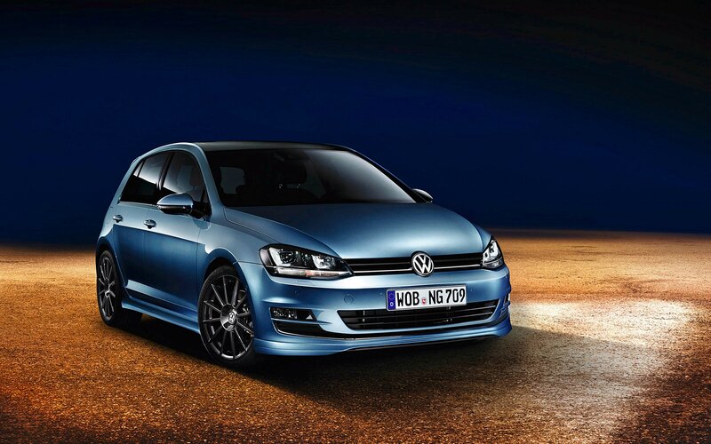 Blue Volkswagen Golf — Dramatic, Night, Photograph