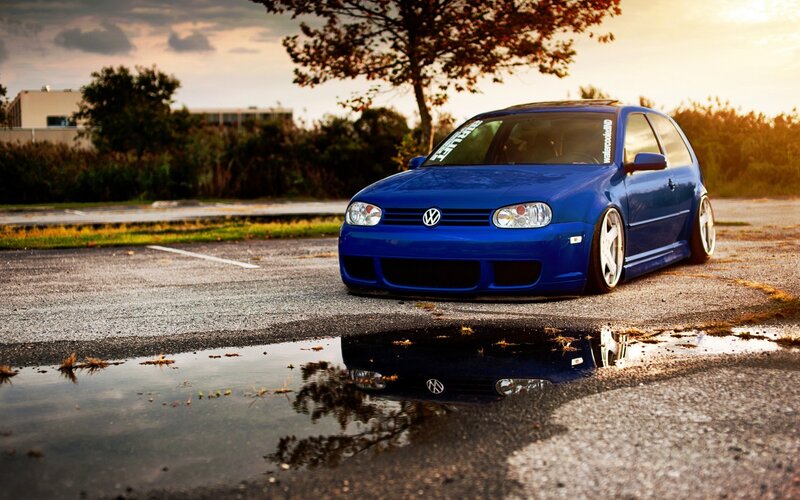 Blue Volkswagen Golf — Dramatic, Sunset
