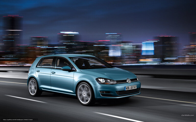 Blue Volkswagen Golf in city