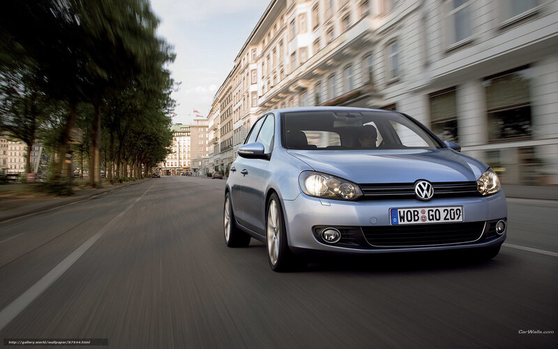 Blue Volkswagen Golf in city