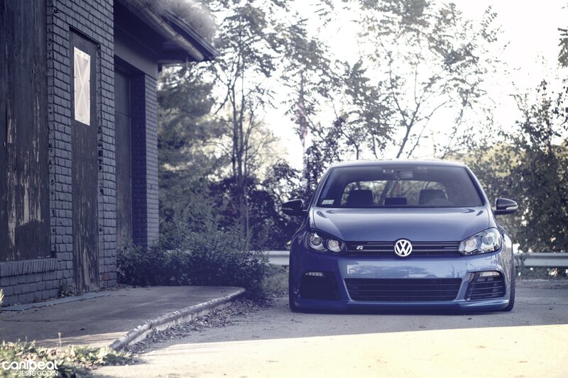 blue volkswagen golf r parked