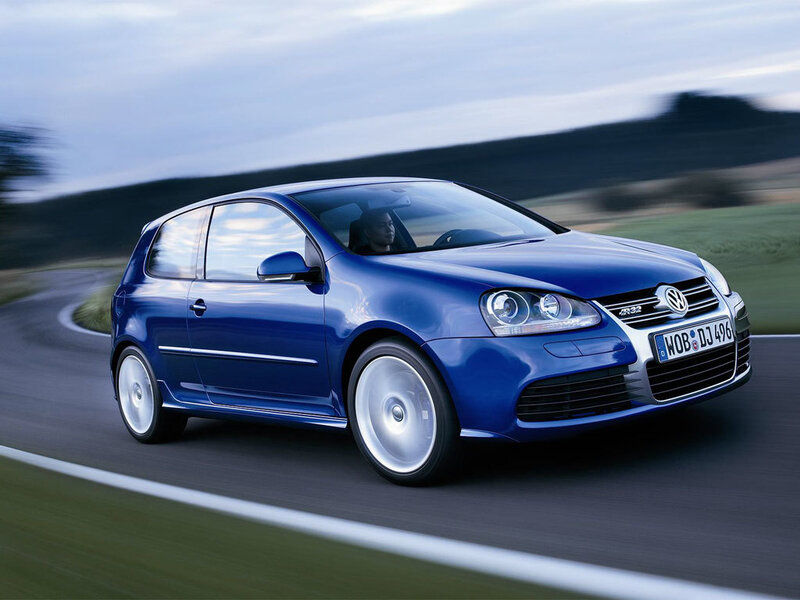 Blue Volkswagen Golf R32 in motion