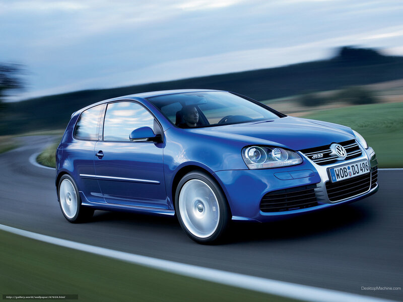 Blue Volkswagen Golf R32 in motion
