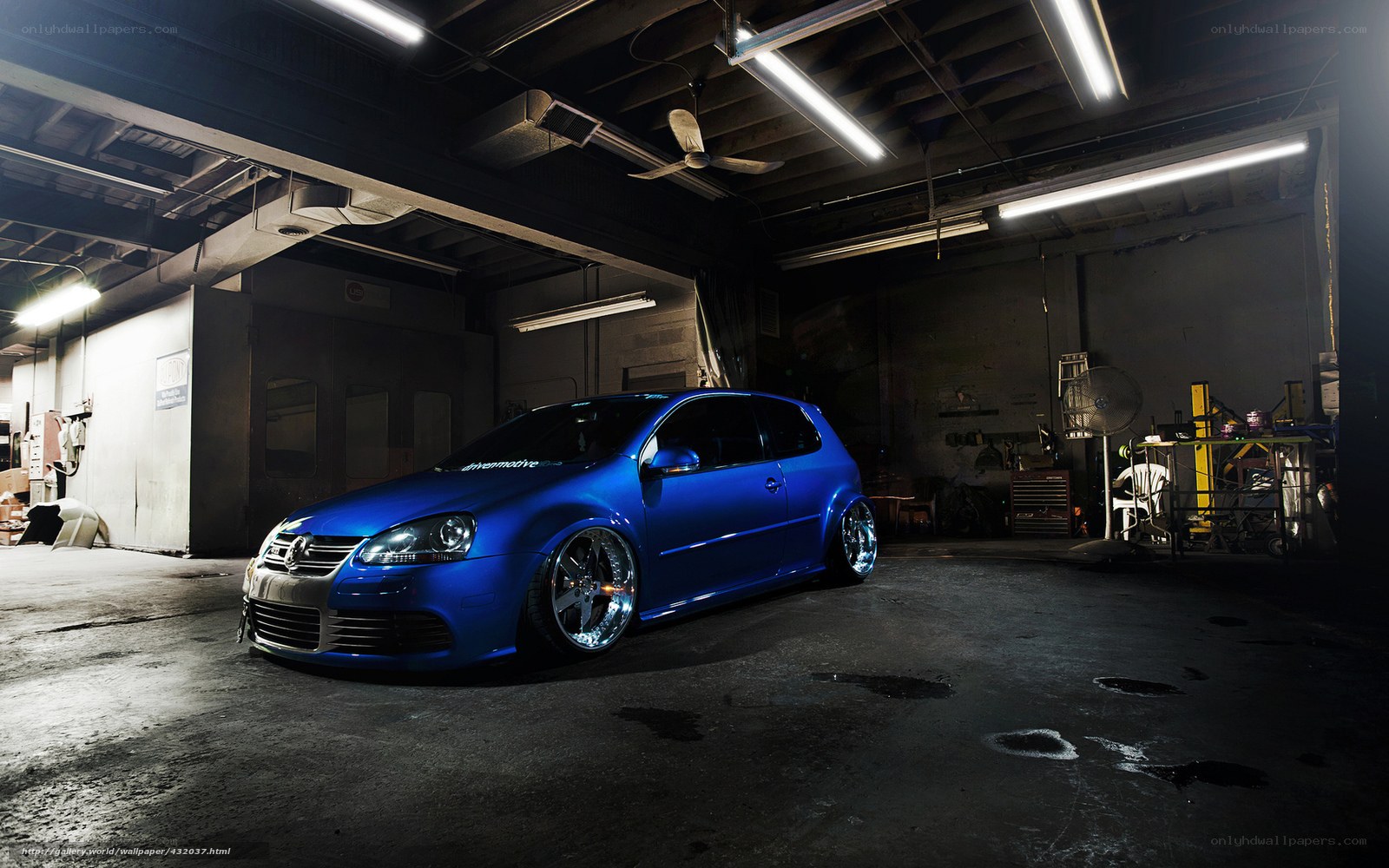 Blue Volkswagen in garage