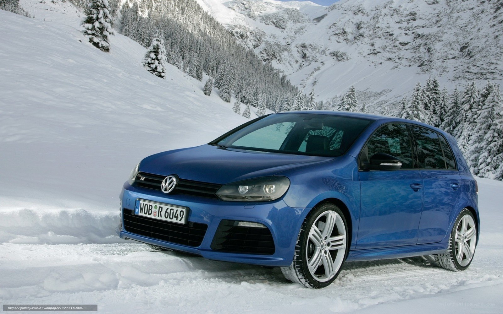 blue volkswagen in snow