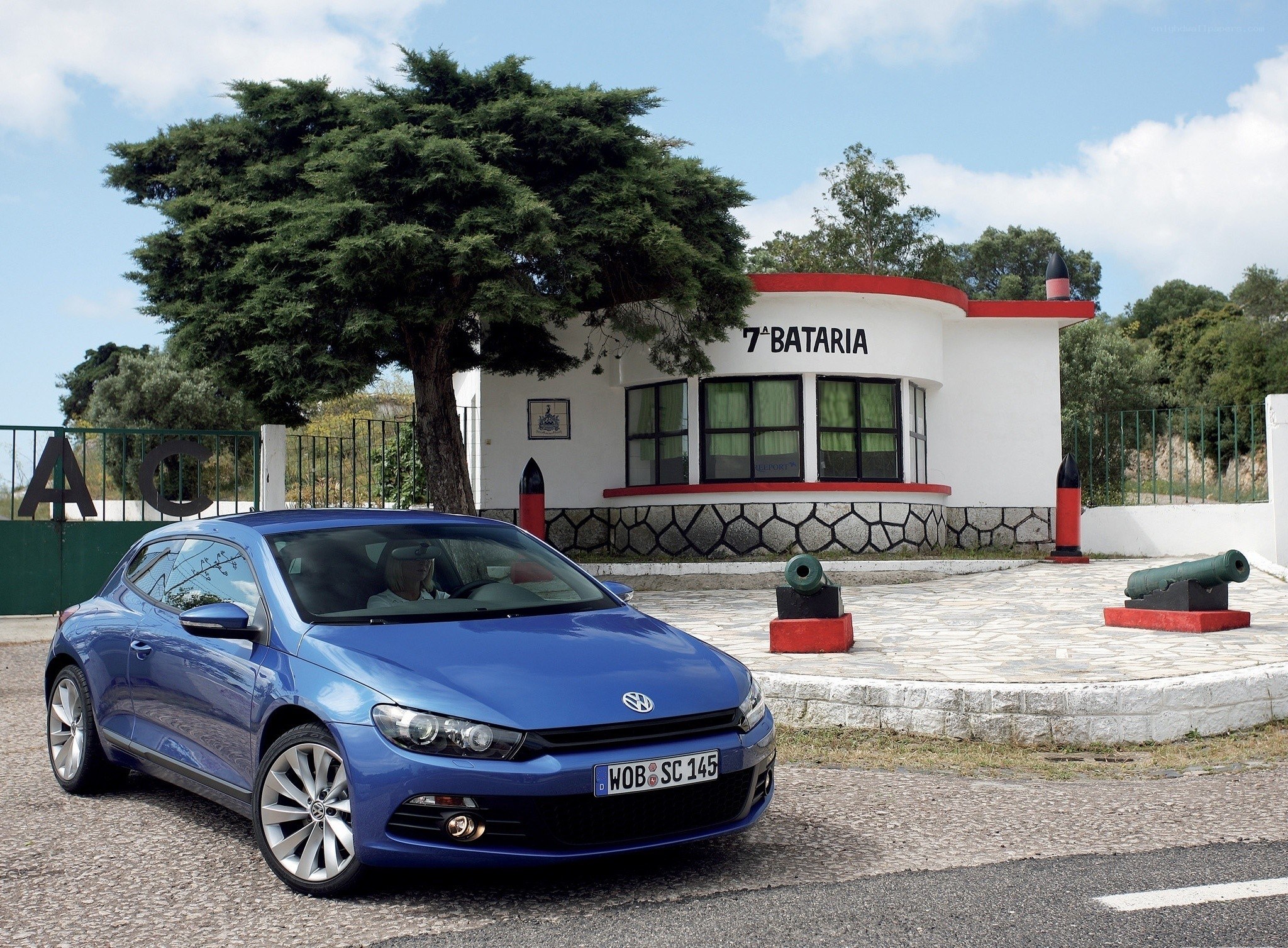 Blue Volkswagen Scirocco parked