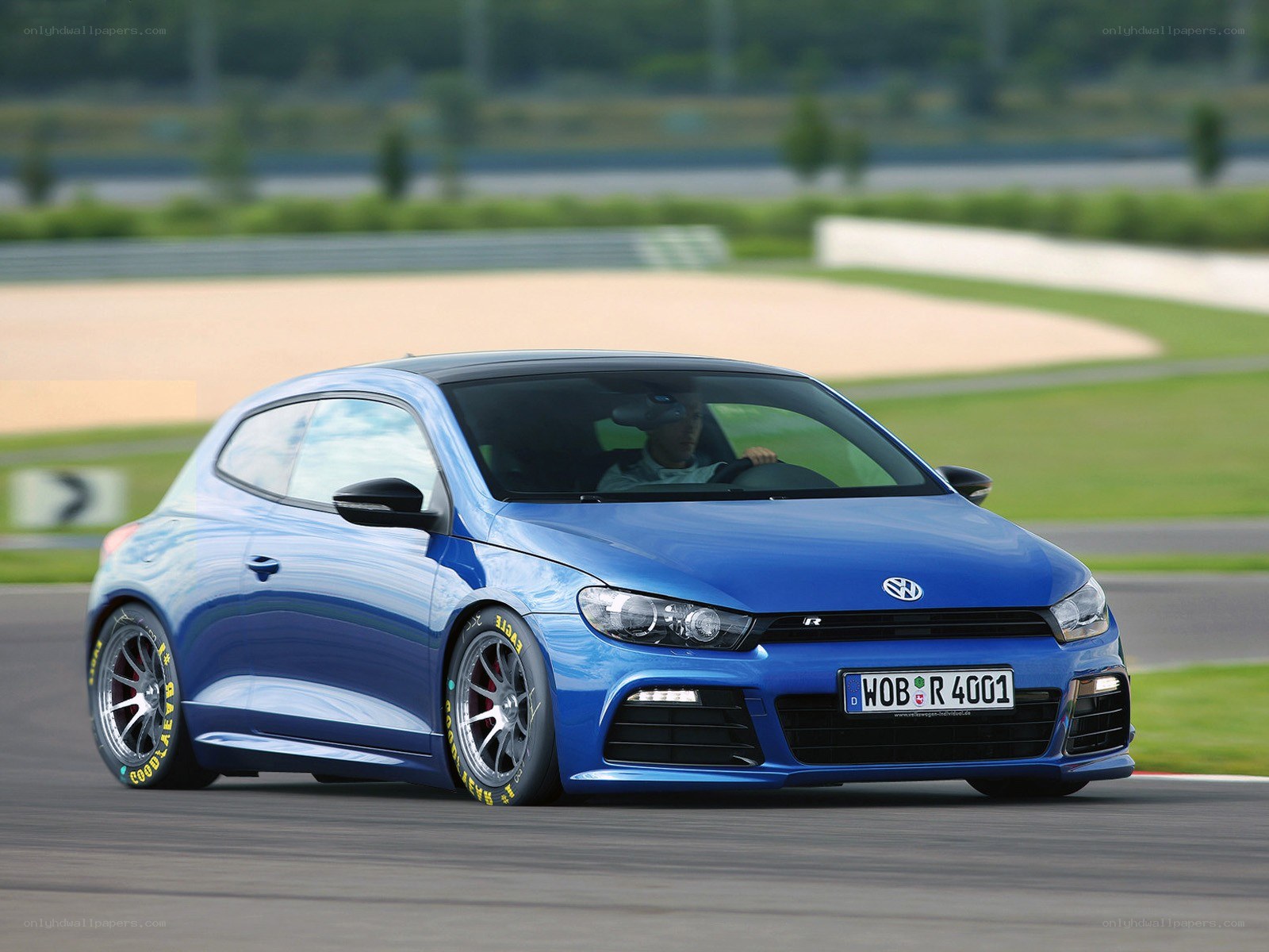 Blue Volkswagen Scirocco R on racetrack
