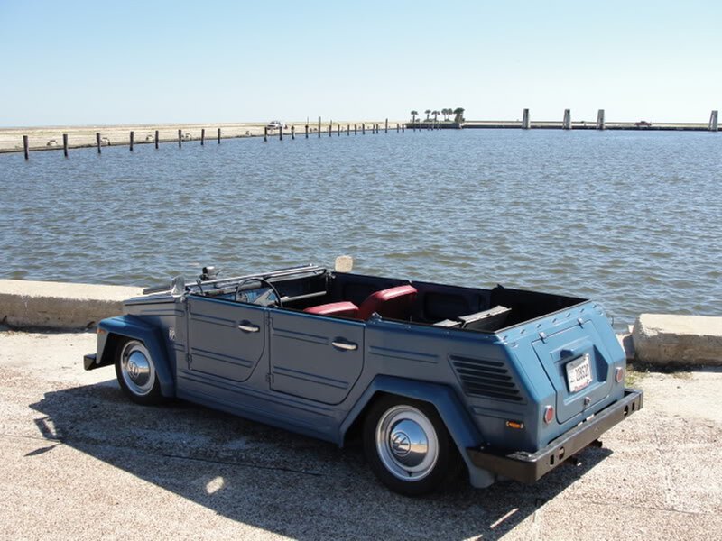Blue Volkswagen Thing by the water