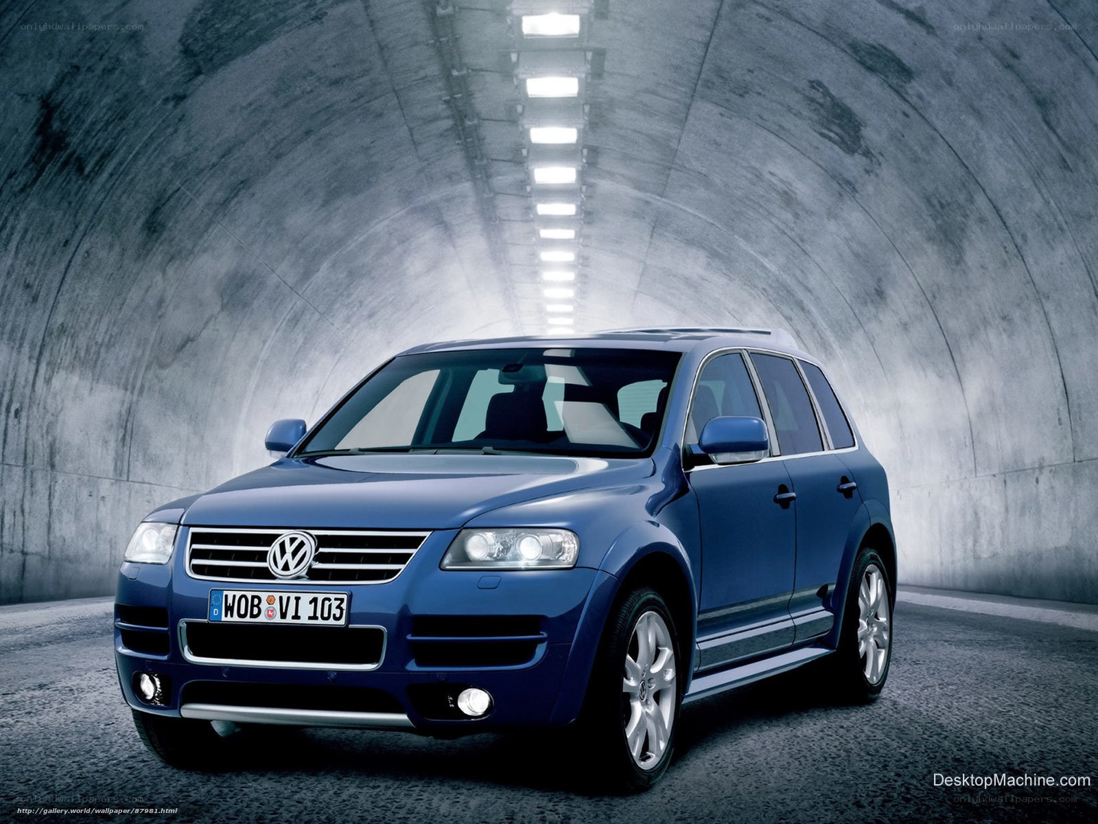 Blue Volkswagen Touareg in tunnel