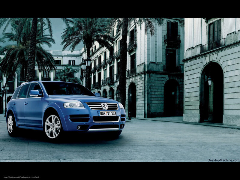 Blue Volkswagen Touareg on city street