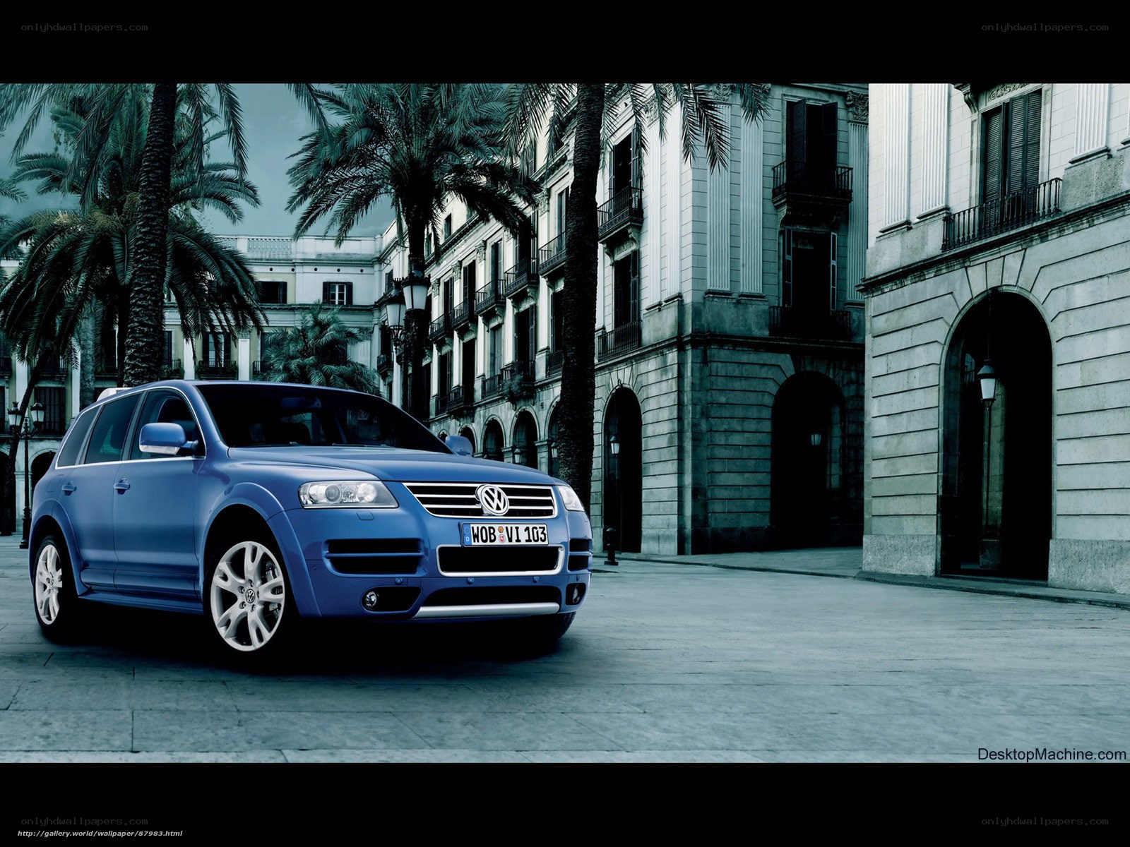 Blue Volkswagen Touareg on city street