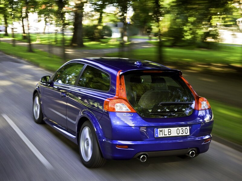 blue volvo c30 in motion