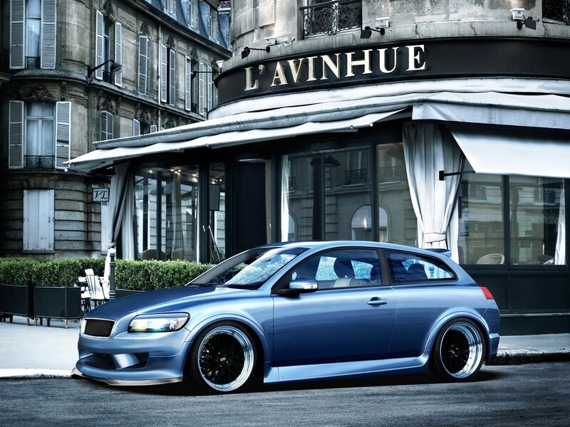 Blue Volvo C30 parked on street