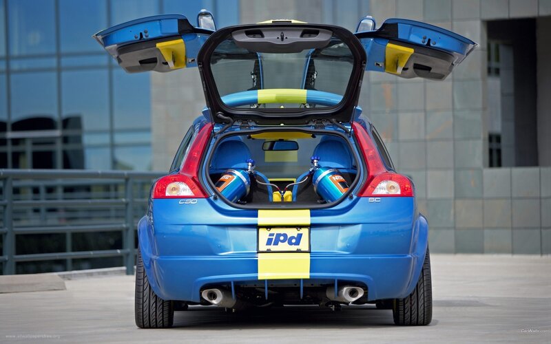 blue volvo c30 with open doors