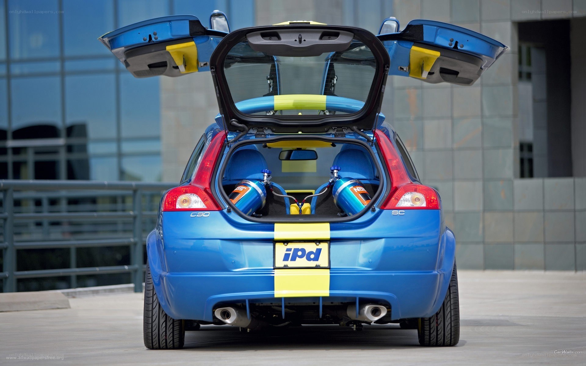 blue volvo c30 with open doors
