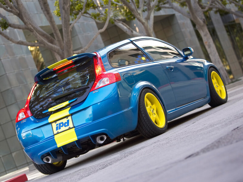 Blue Volvo C30 with yellow wheels
