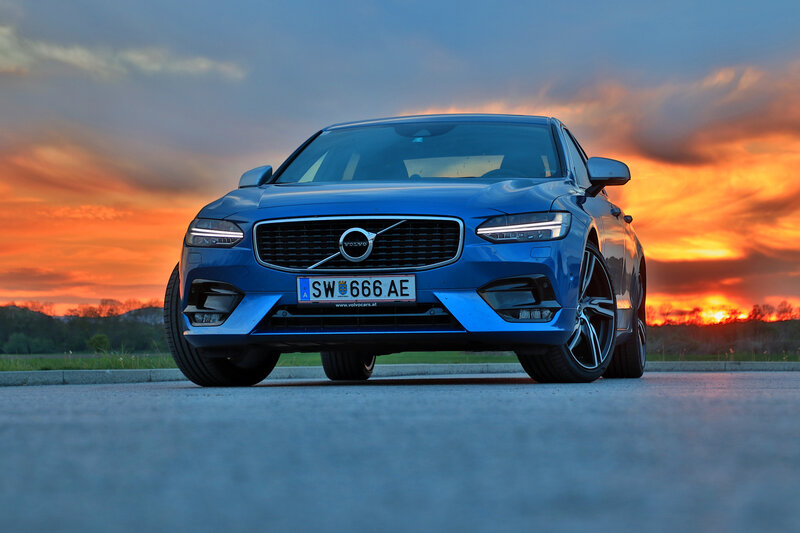 Blue Volvo Car — Dramatic, Sunset