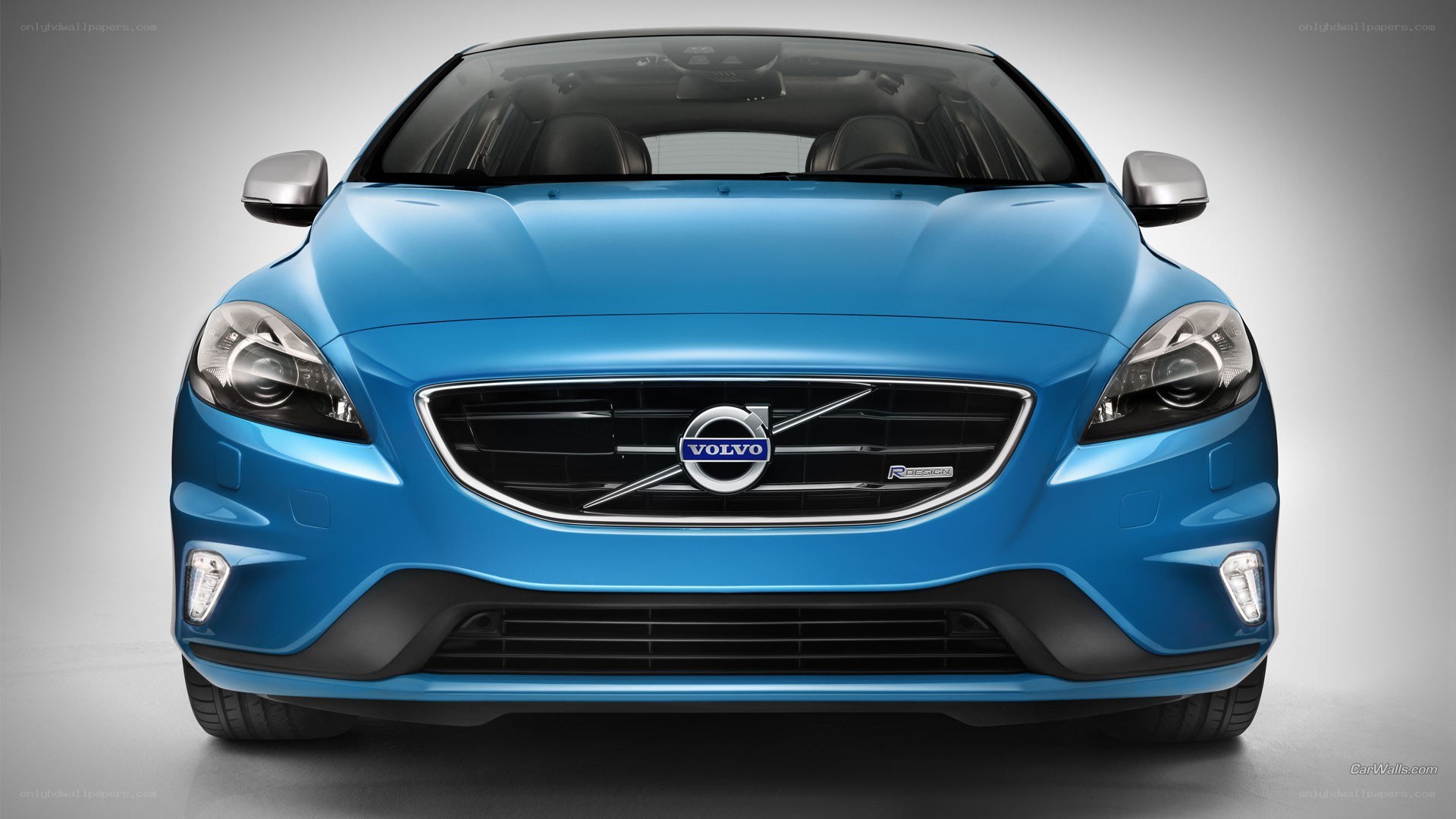blue volvo car front view