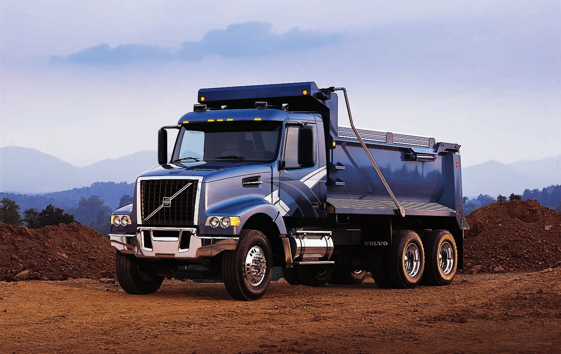blue volvo dump truck