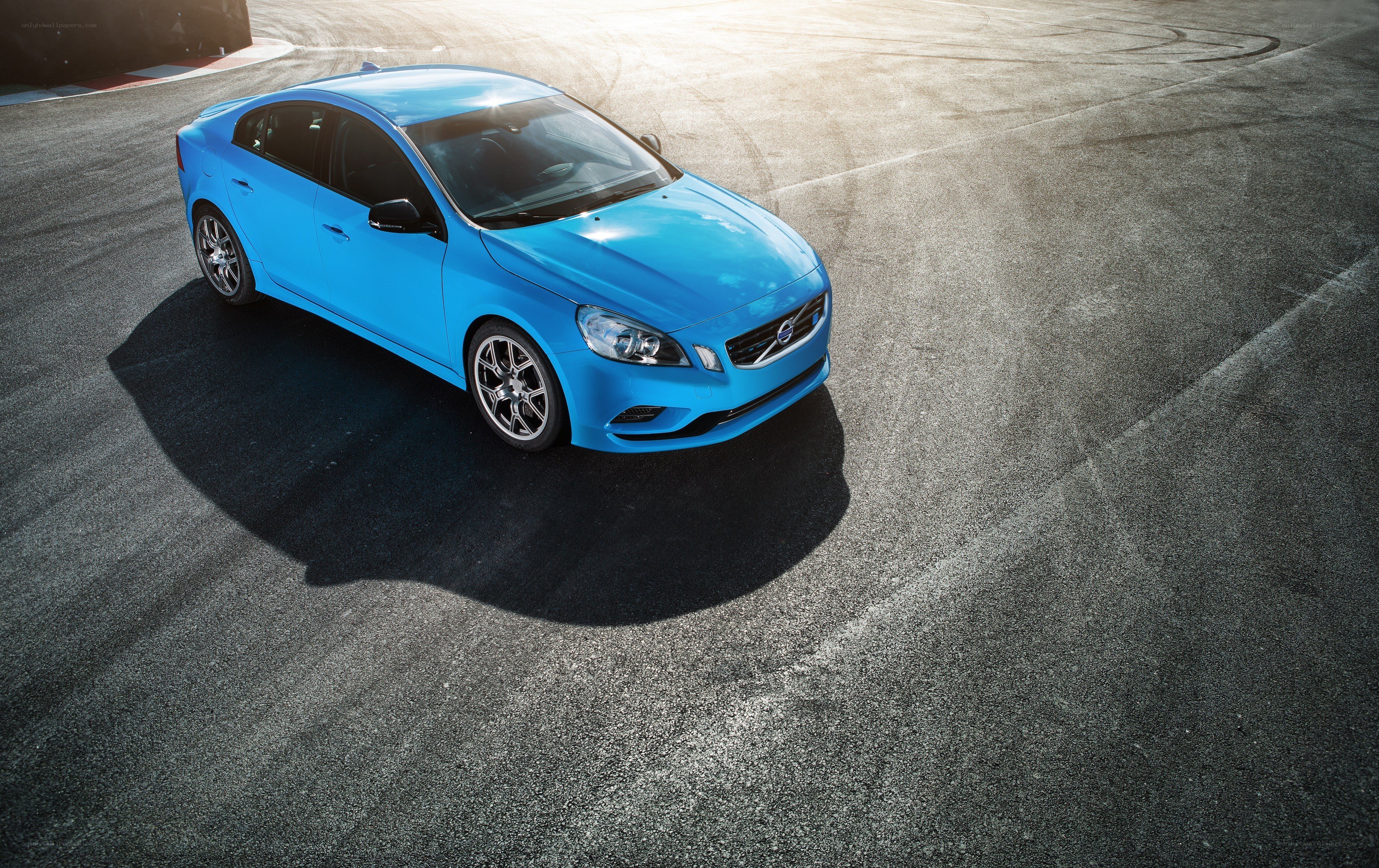 Blue Volvo on a racetrack