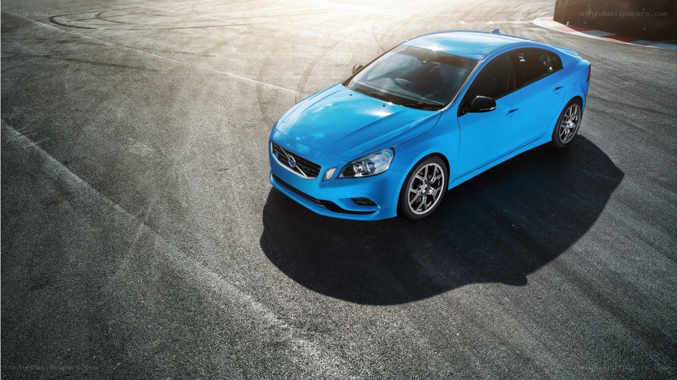 blue volvo on racetrack