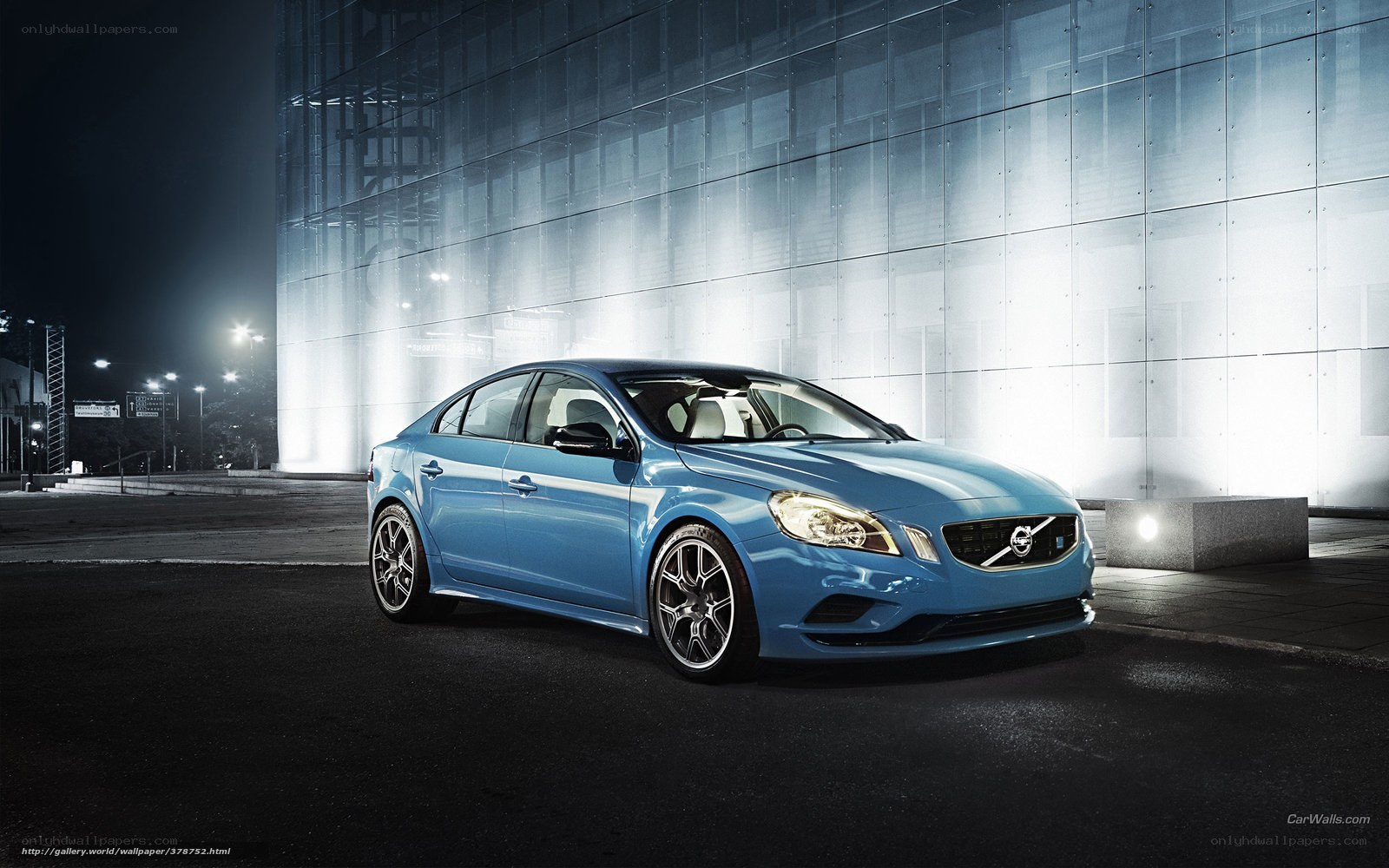Blue Volvo S60 at night
