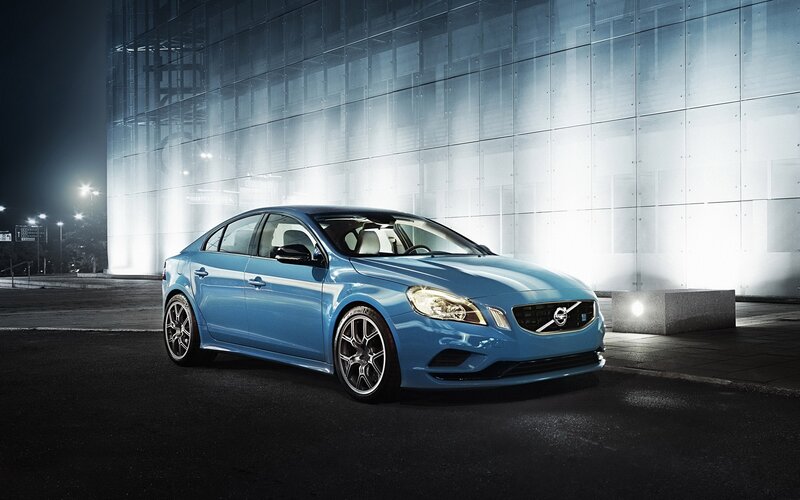 Blue Volvo S60 in urban setting