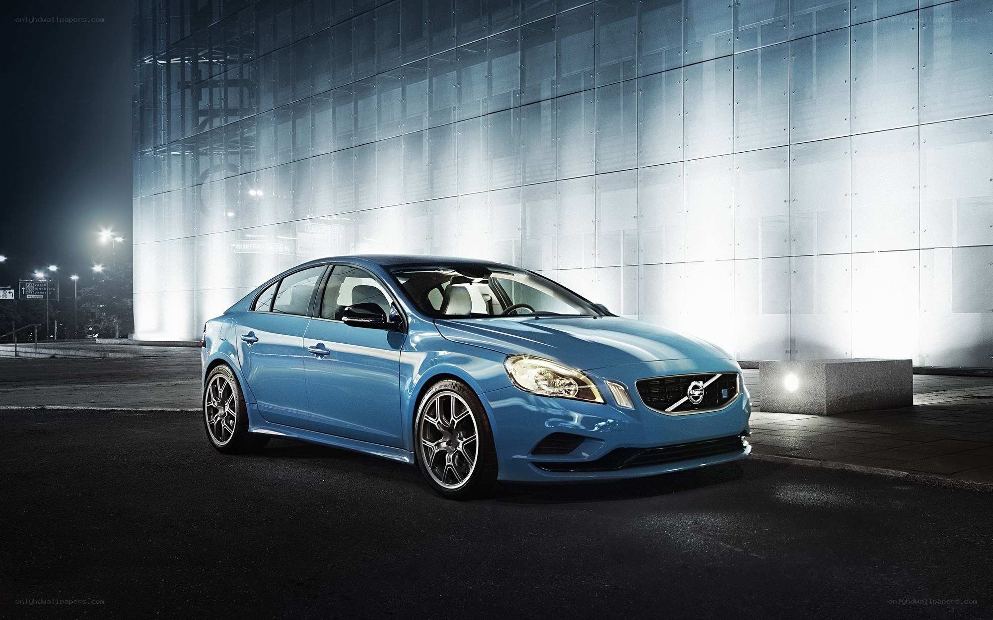 Blue Volvo S60 in urban setting
