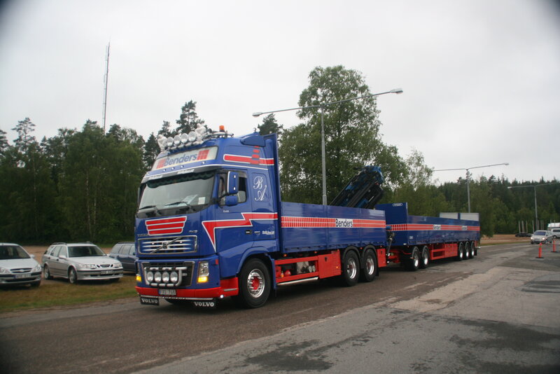 Blue Volvo truck with trailer