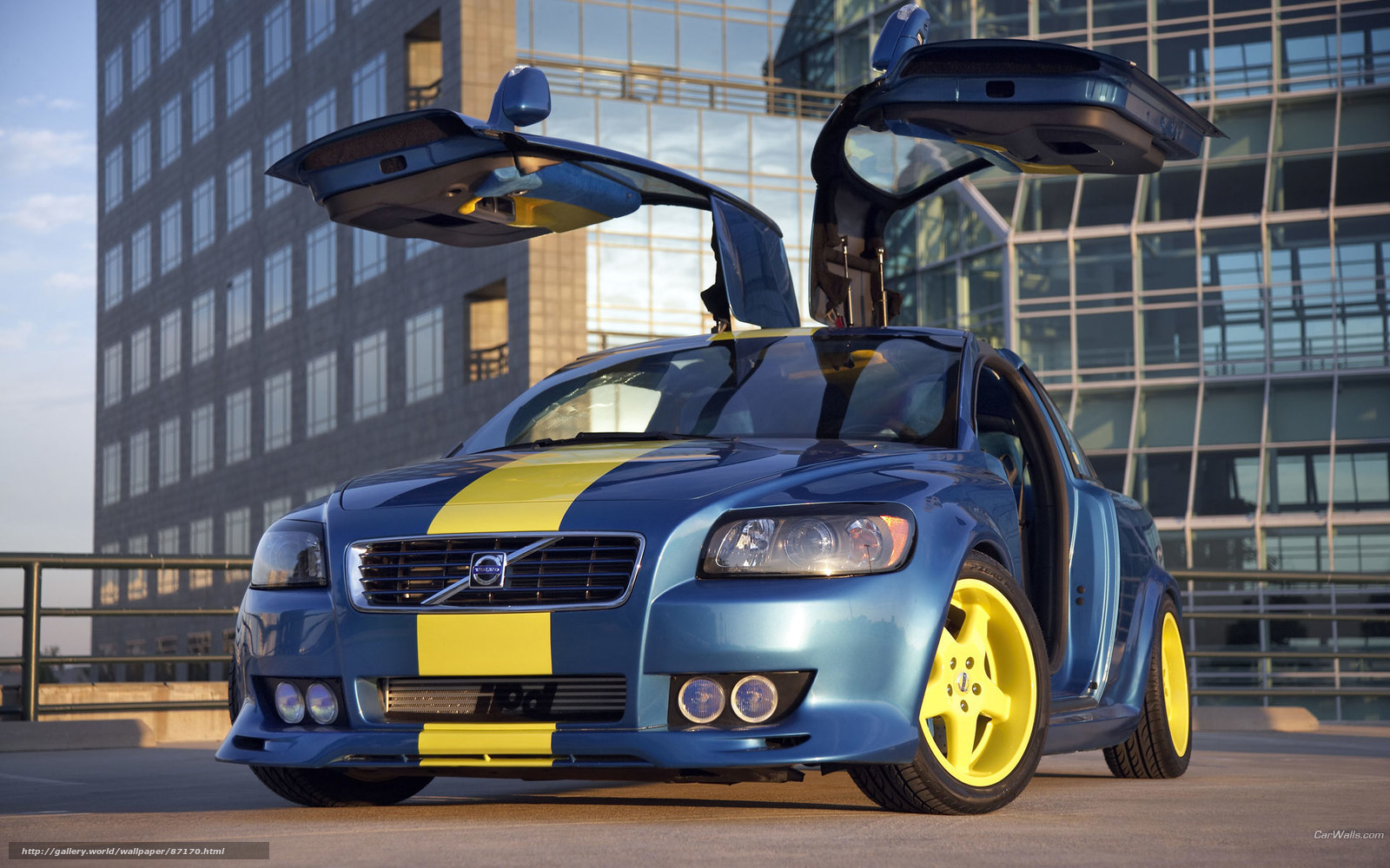 blue volvo with yellow stripes