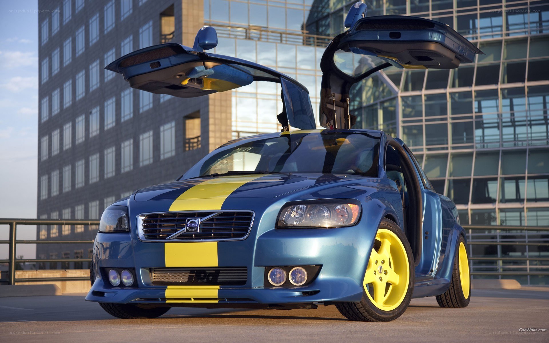 blue volvo with yellow stripes