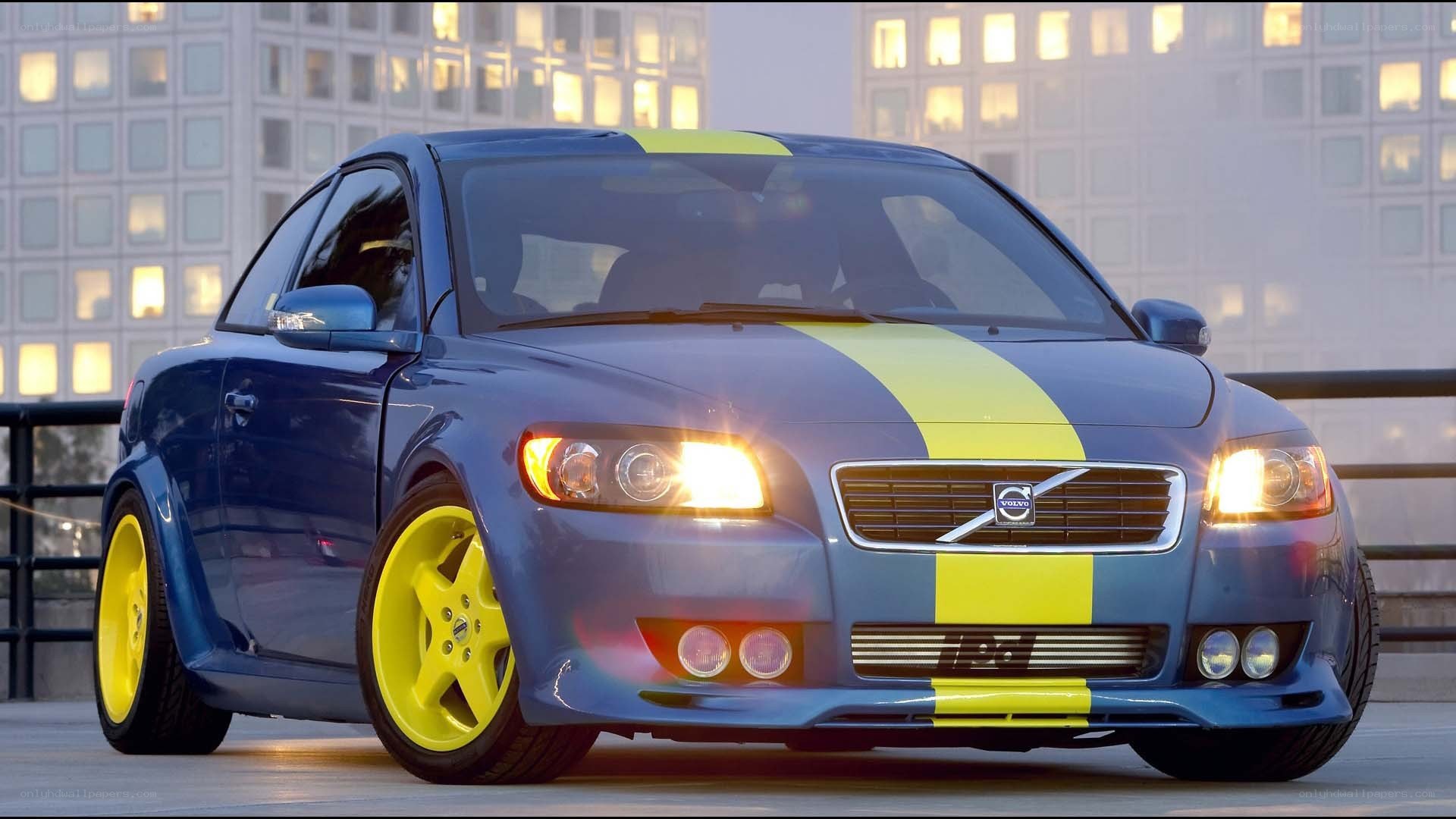blue volvo with yellow stripes