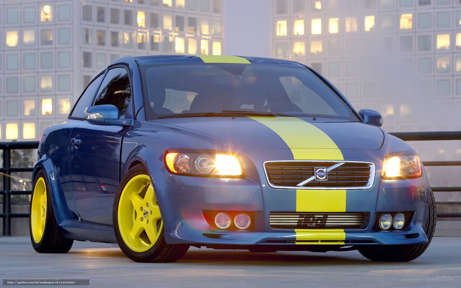 blue volvo with yellow stripes