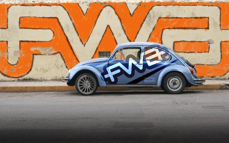 Blue VW Beetle with FWD branding