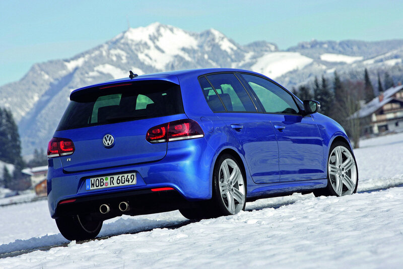Blue VW Golf R in snowy landscape