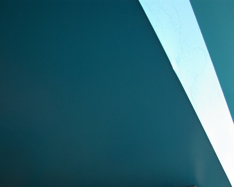 blue wall with light beam