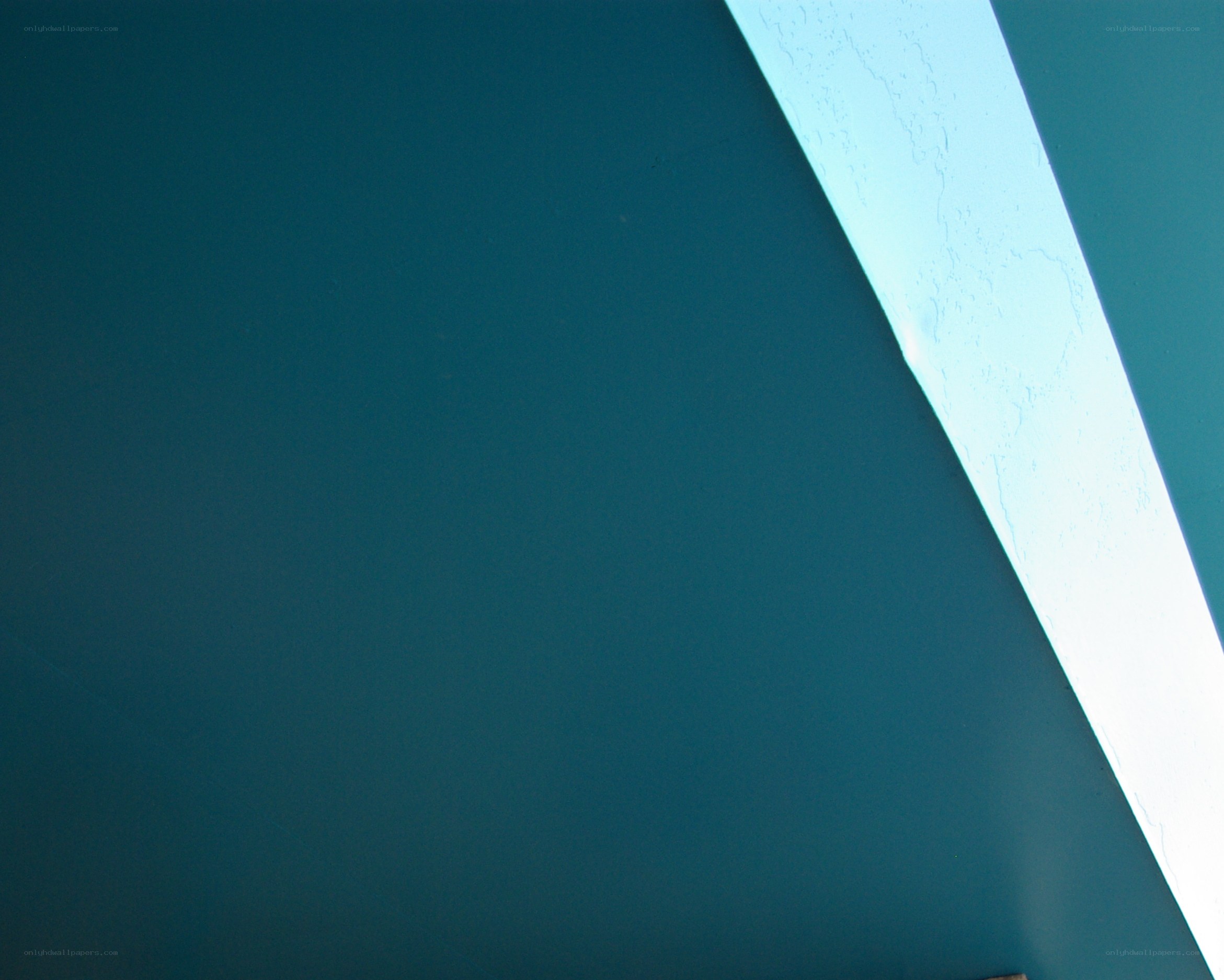 blue wall with light beam