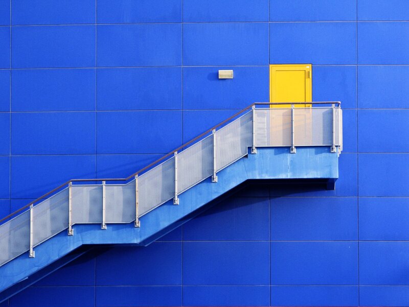 Blue Wall with Yellow Door
