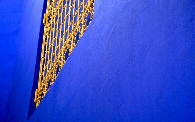 Blue wall with yellow gate