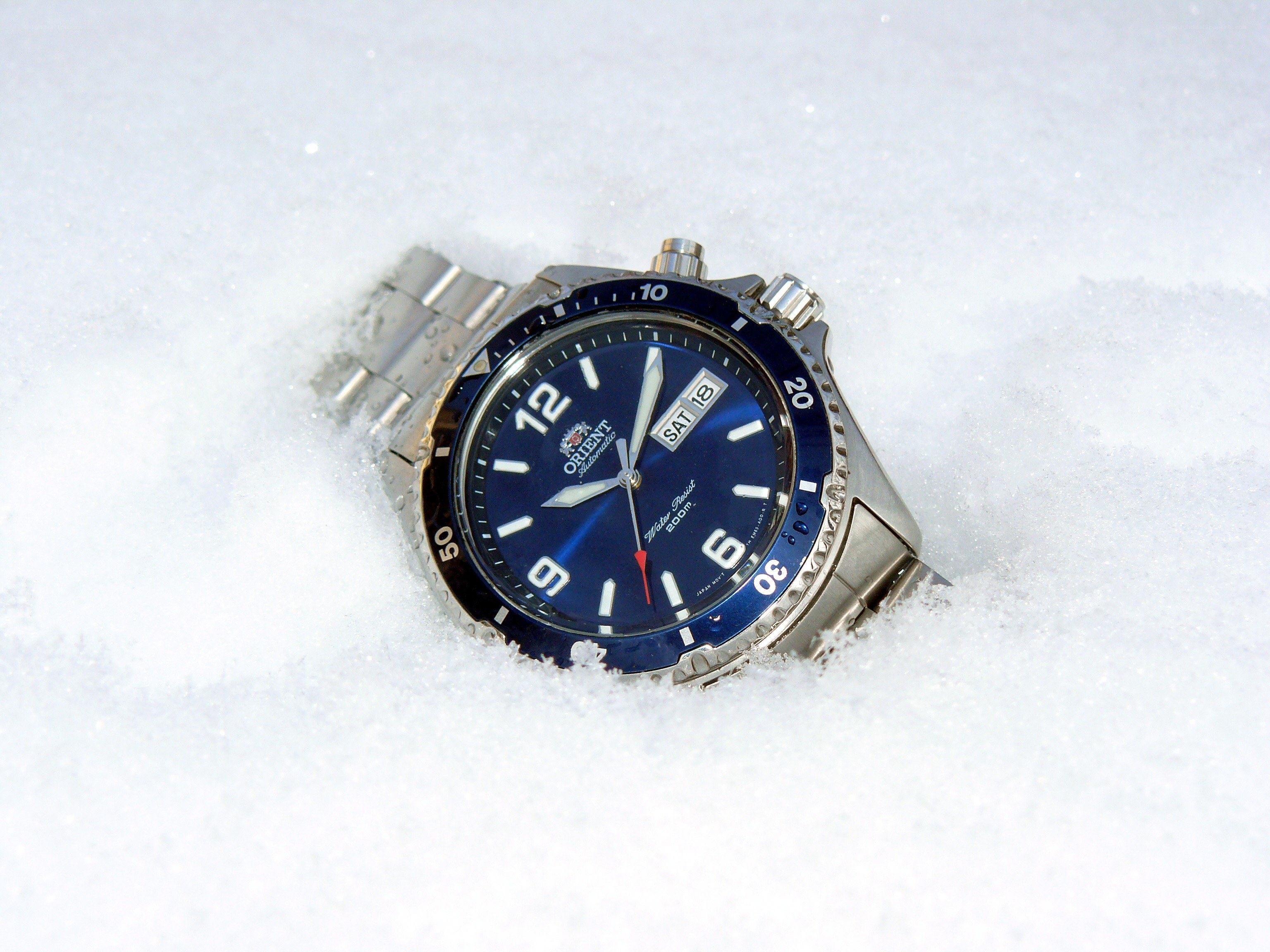 Blue watch in the snow