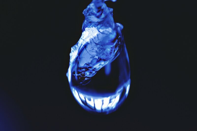 Blue Water Droplet — Dramatic
