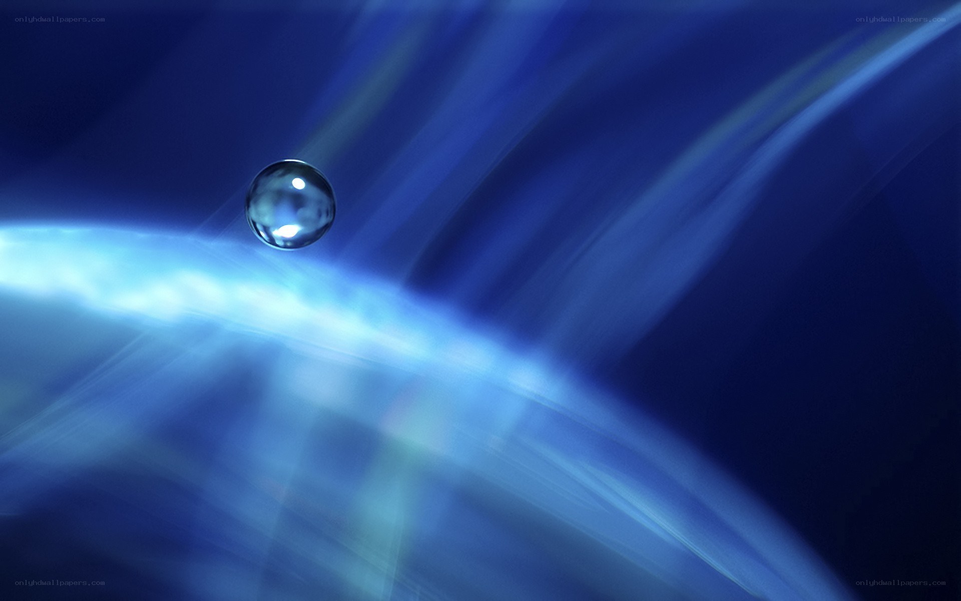 Blue water droplet on light