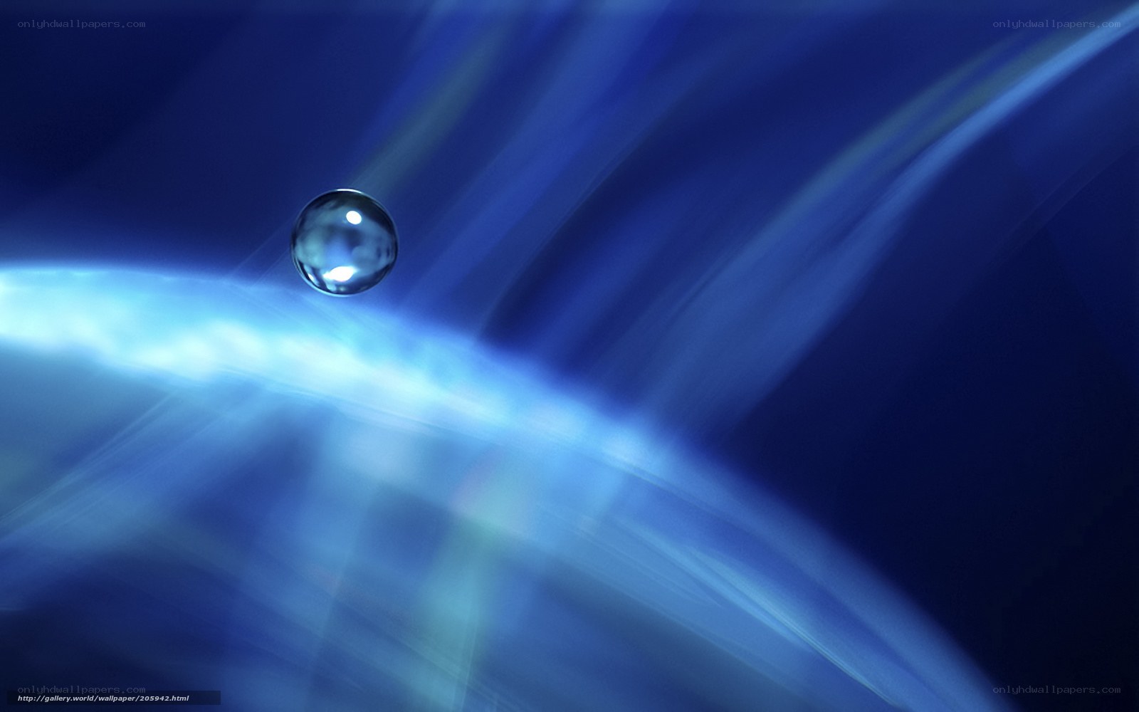 Blue water droplet on light