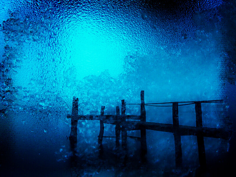 blue water droplets on glass