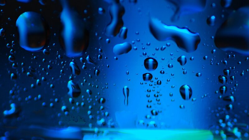 blue water droplets on glass