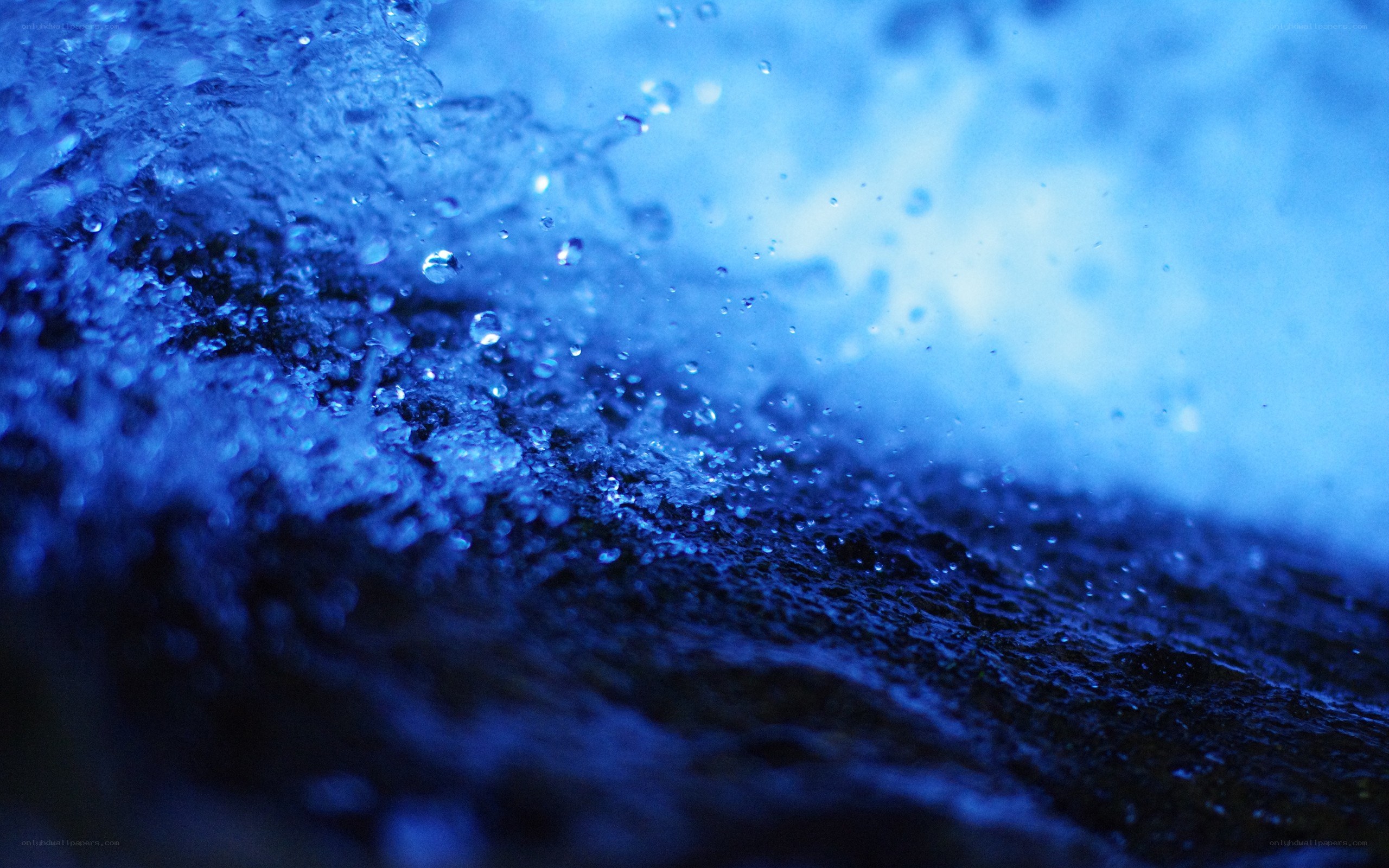 blue water droplets splashing