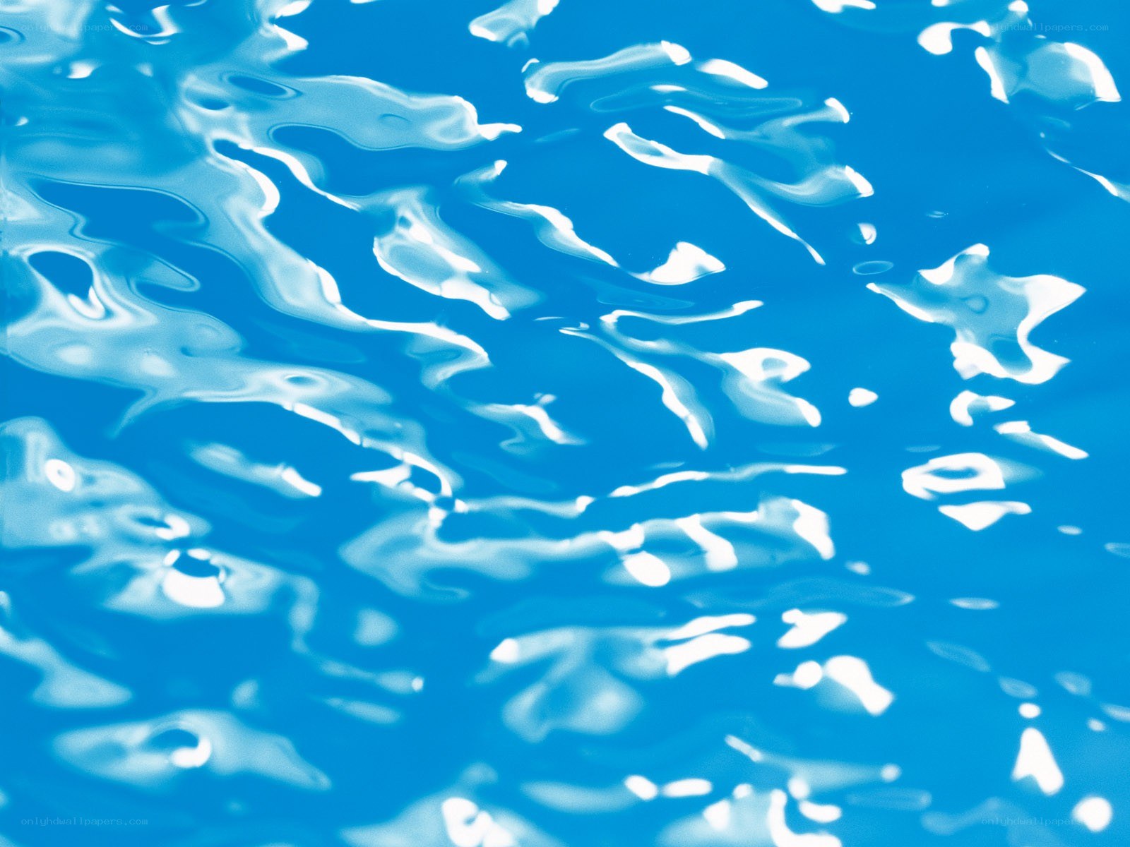 Blue water surface with ripples