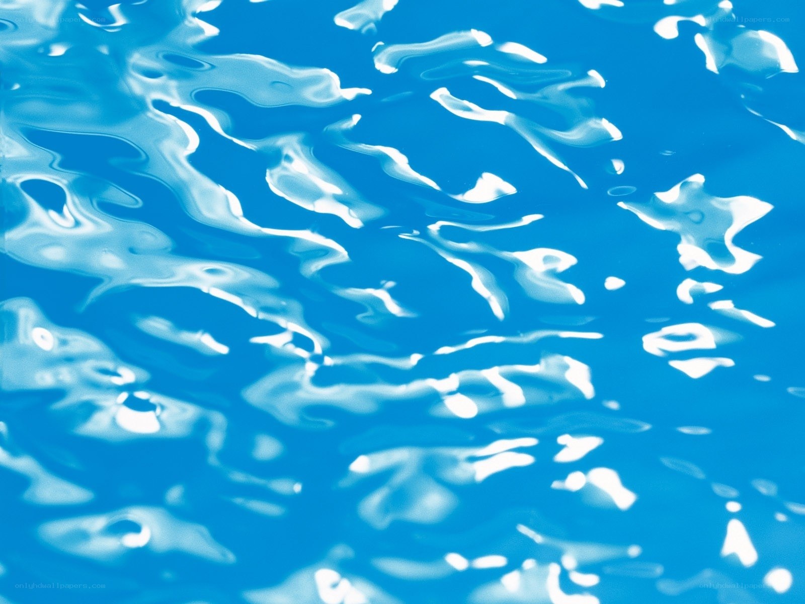 Blue water surface with ripples