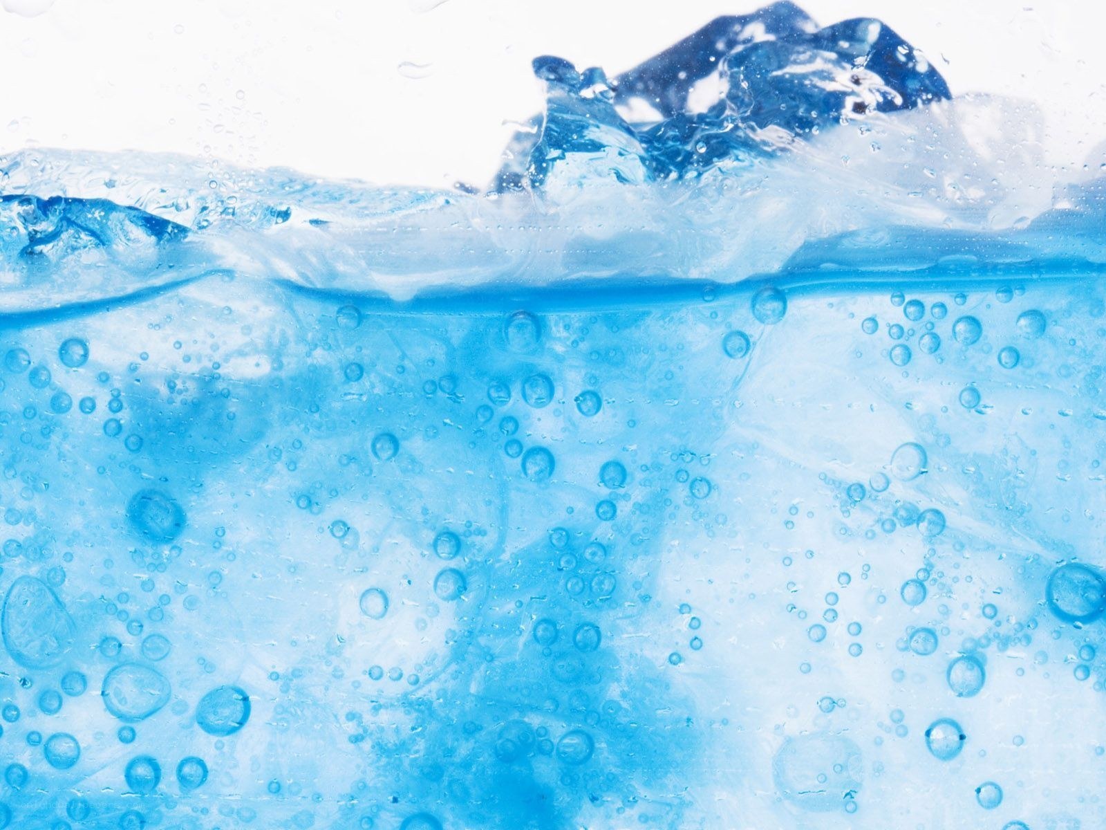 blue water with ice and bubbles